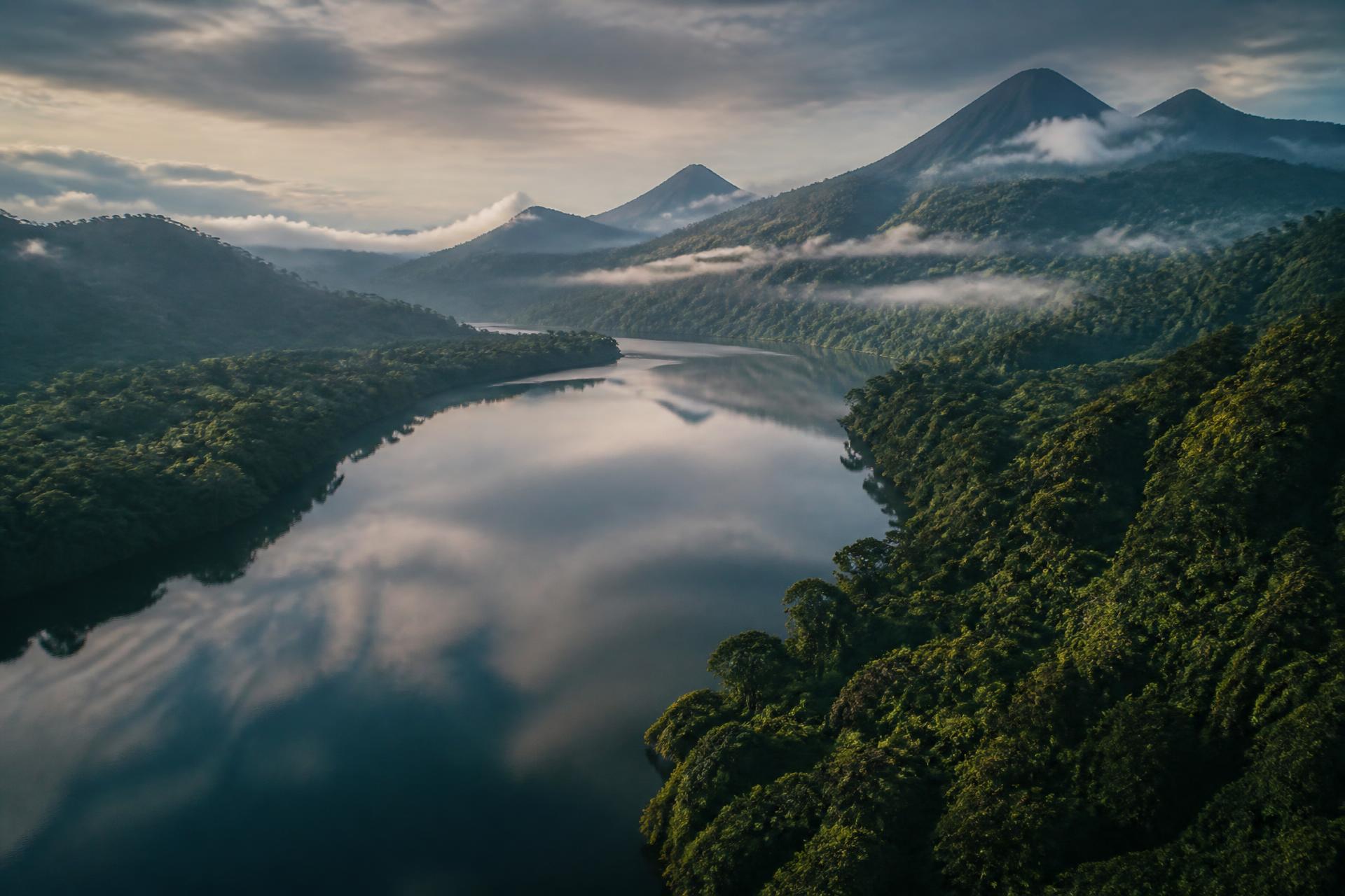 Aerial view of a Guatemalan river winding through rainforest